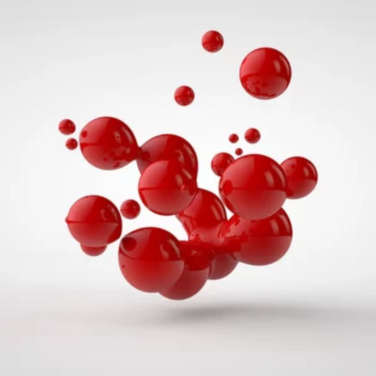 Red liquid candle dye droplets